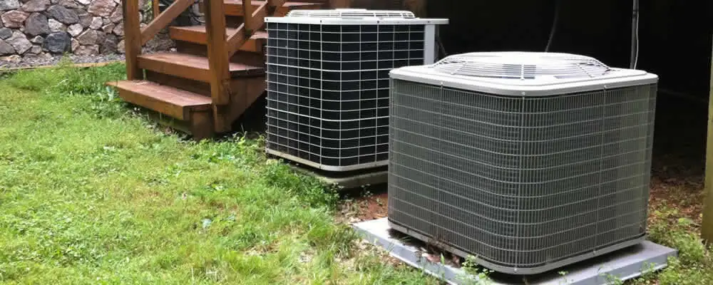 Heat pump installation and service units outside a home in Champaign, IL